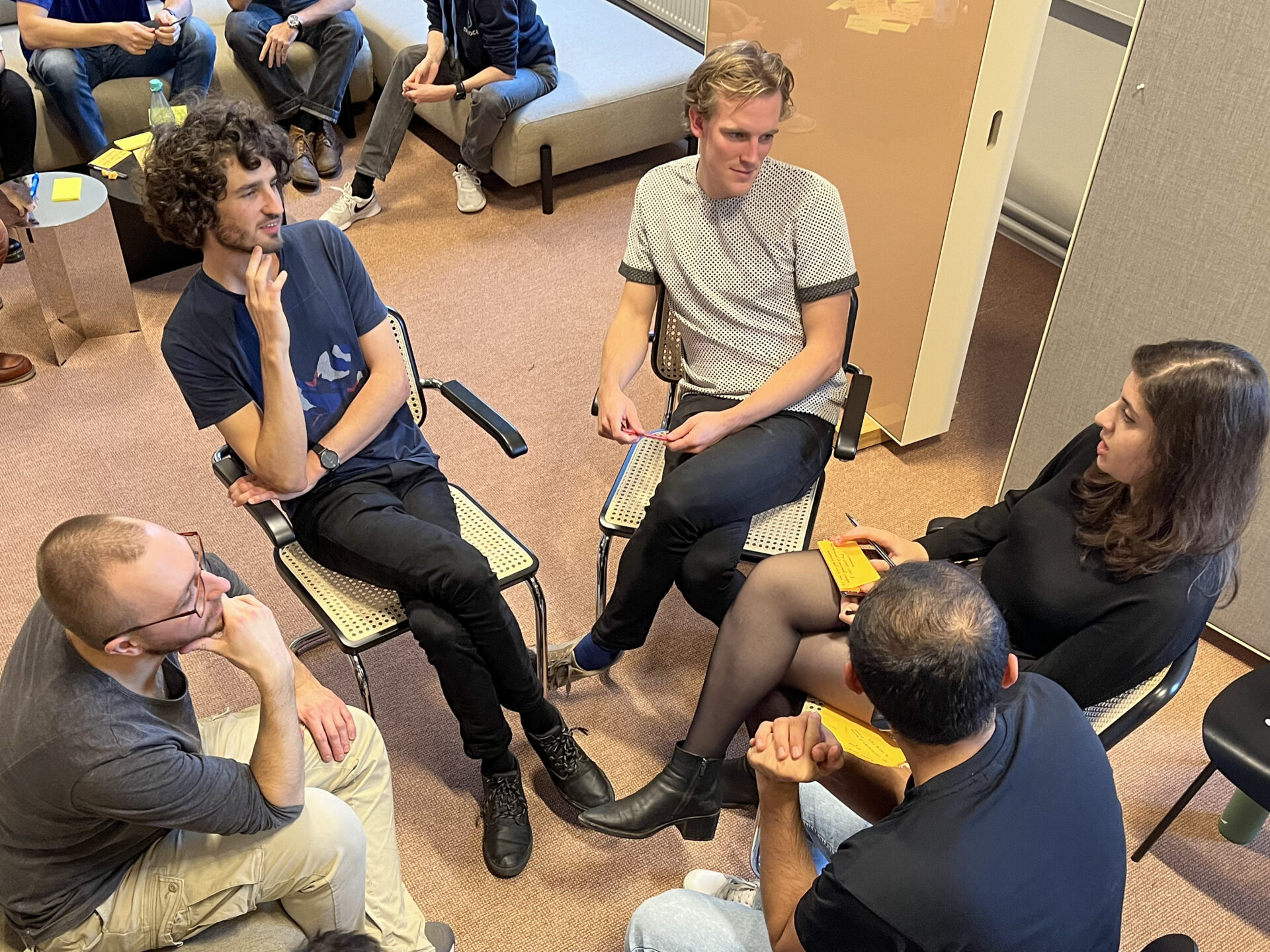 small_group_huddle_over-shot_female